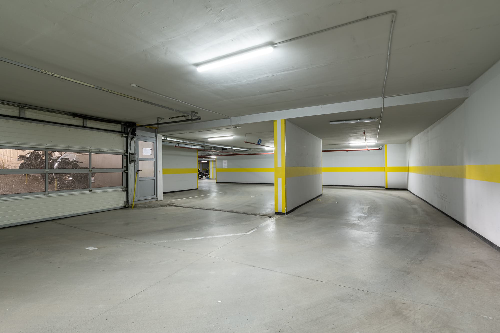 Three parking spots in a single unit in the NIVEL building, Budva
